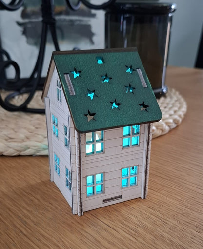 Ziemassvētku namiņš ar gaismiņu